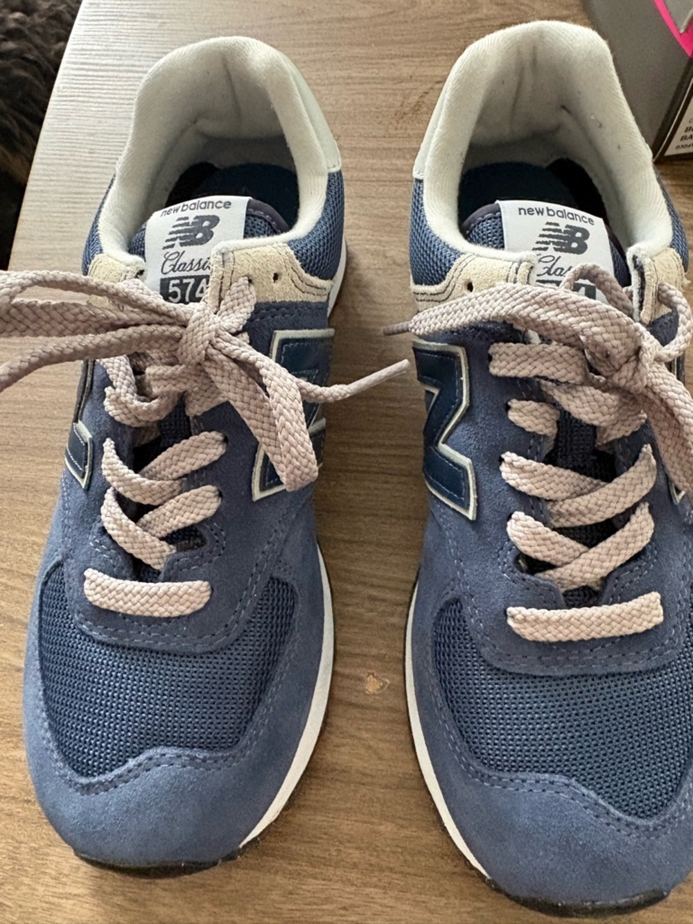 New Balance navy blue and beige 574 athletic sneakers